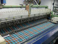 Highlands of Haliburton Tartan weaving on the loom